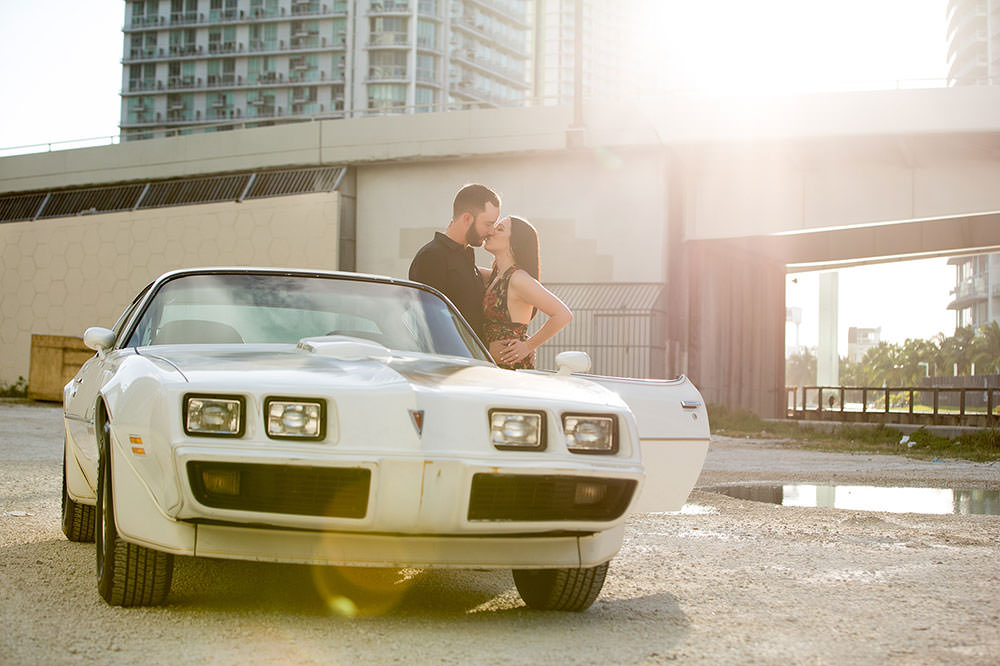 Downtown miami engagement session with a vintage car.
