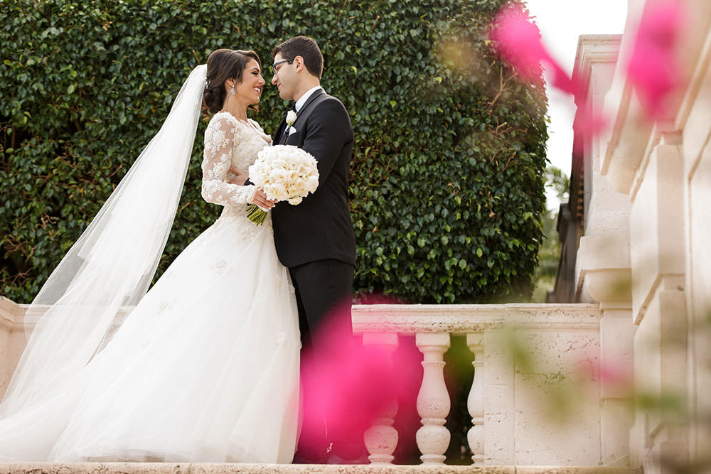 Bride and Groom on the staircase at the Biltmore Hotel in Coral Gables.
