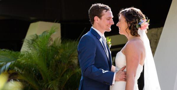 Bride and groom in front of St Hughs Church in Coconut Grove.